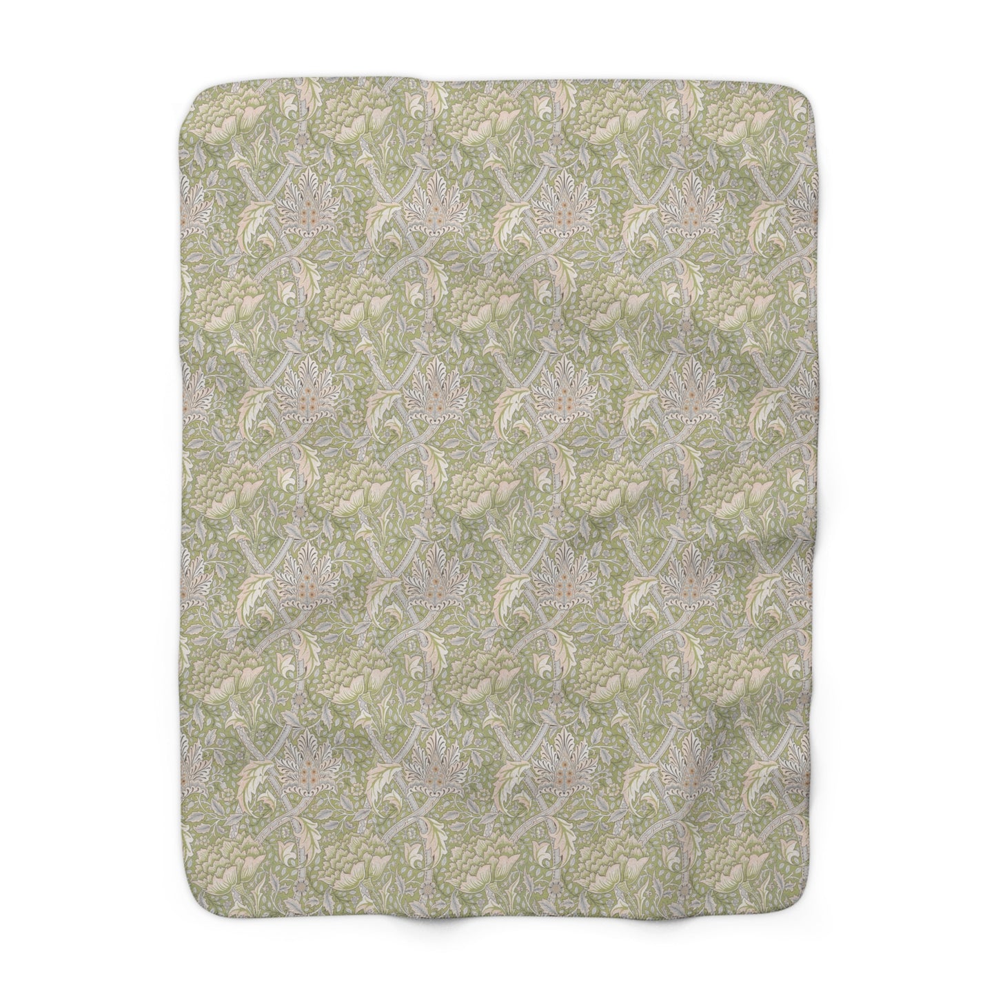A plush fleece blanket with a floral pattern in green and white tones, inspired by William Morris.