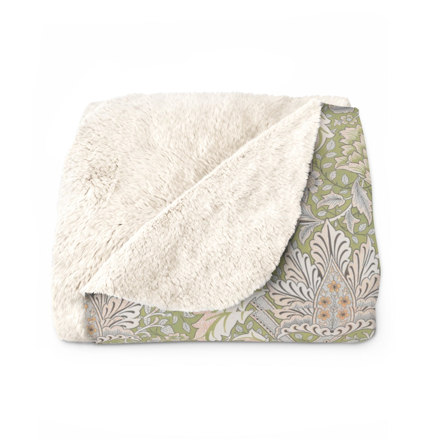 A plush fleece blanket with a floral pattern in green and white tones, inspired by William Morris.