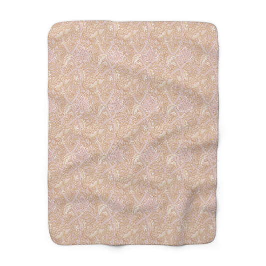 A beige and brown patterned Sherpa fleece blanket inspired by William Morris, from the Windrush Collection.