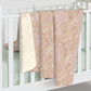 A beige and brown patterned Sherpa fleece blanket inspired by William Morris, from the Windrush Collection.