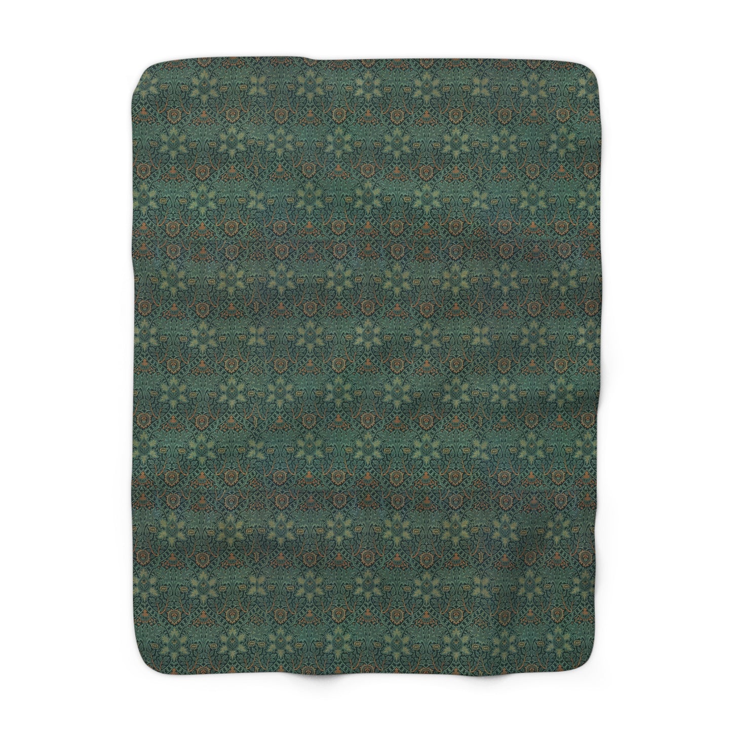 A Sherpa fleece blanket with a floral pattern in green and brown colors, draped over a couch.