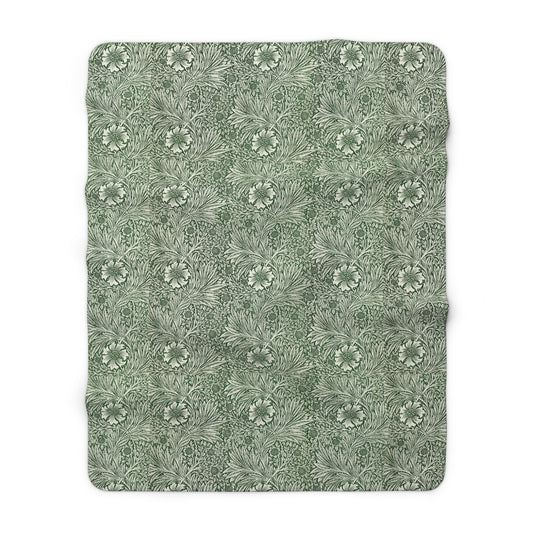 A green Sherpa fleece blanket with a floral pattern inspired by William Morris, displayed flat.