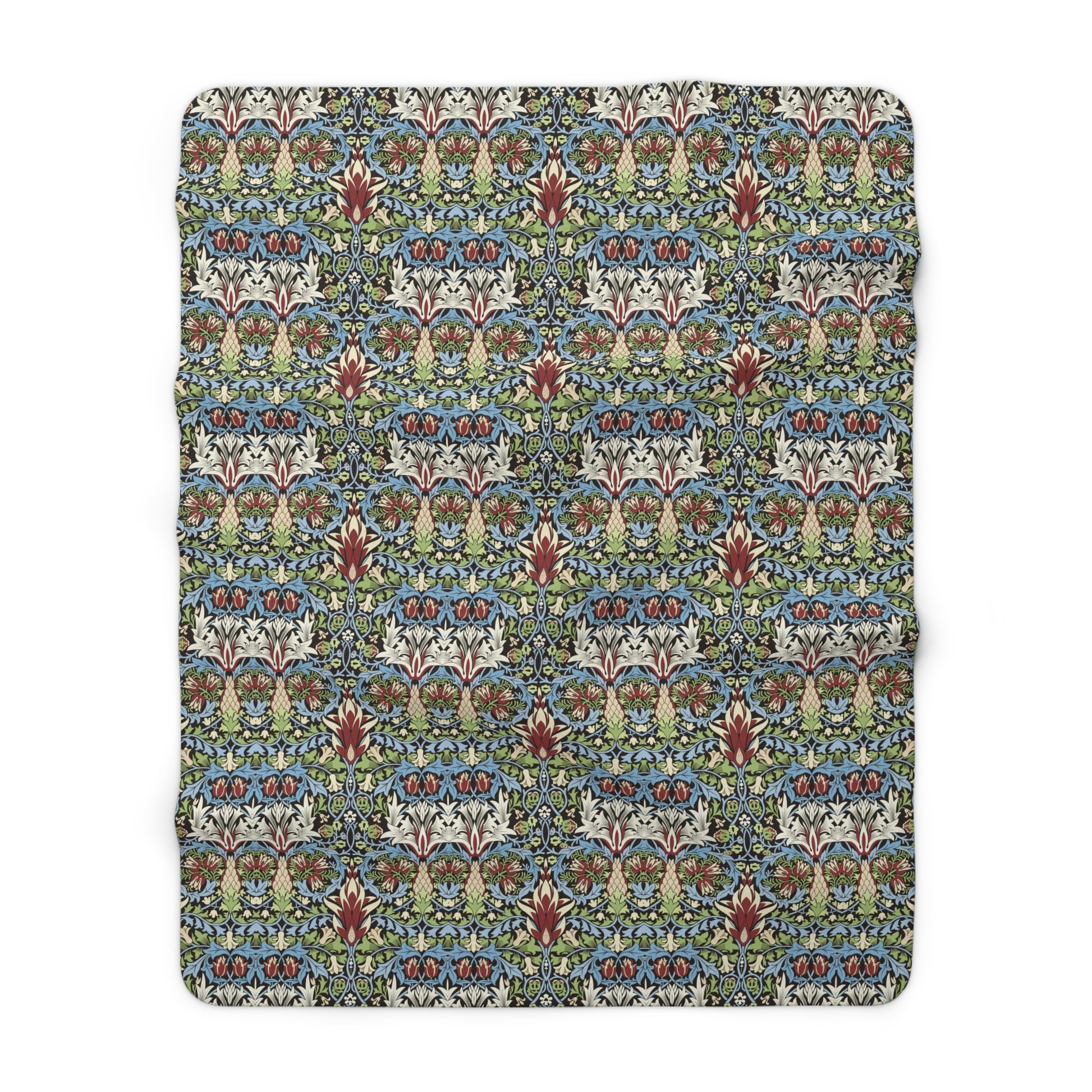Patterned blanket with a floral design on a white background from William Morris