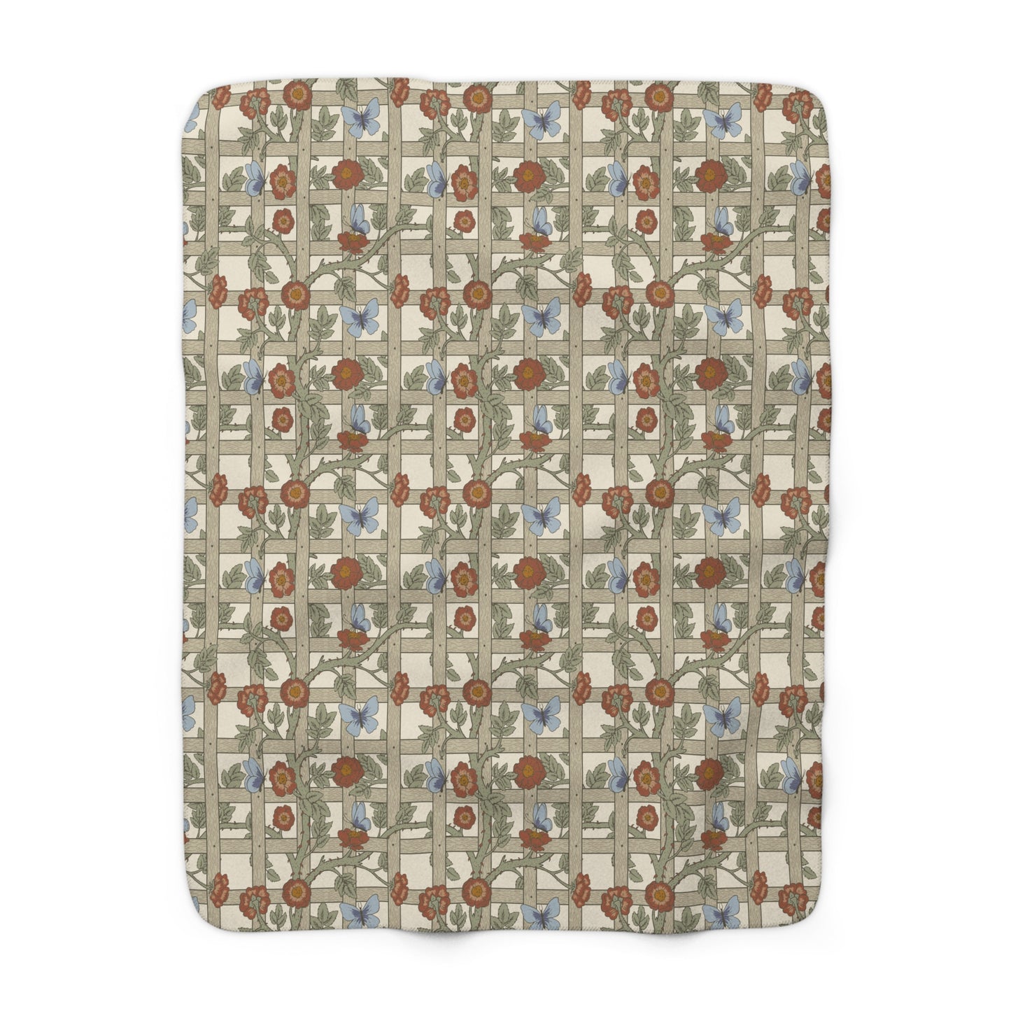 A Sherpa fleece blanket with a floral pattern in beige, green, blue, and red colours on a white background.
