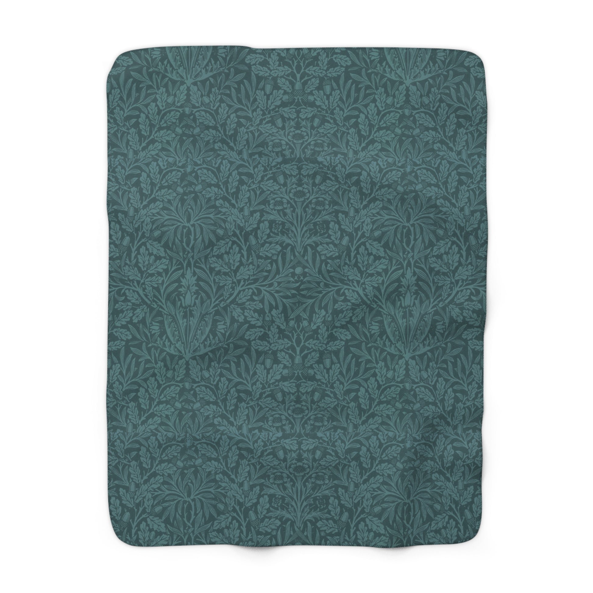 A rectangular Sherpa fleece blanket with a teal colour and a floral pattern inspired by William Morris - Acorns and Oak Trees Collection.