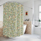 Shower curtain with nature-themed design in a bathroom setting
