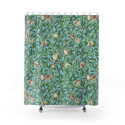 Shower curtain with floral and bird pattern on a blue background