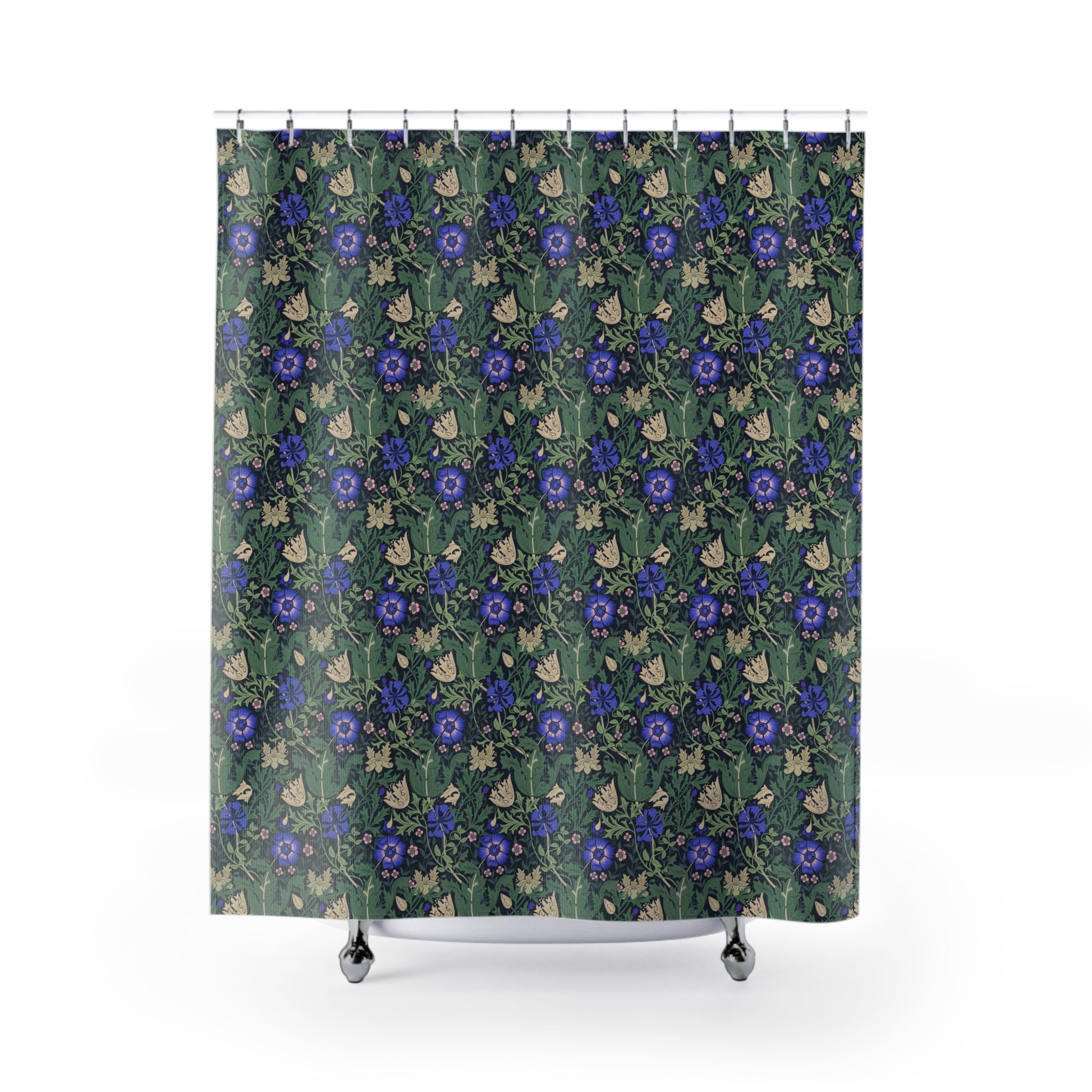 Floral patterned shower curtain with blue flowers on a green background