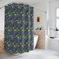 Shower curtain with green leaf pattern in a bathroom setting
