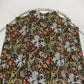 Patterned fabric on a hanger against a white background