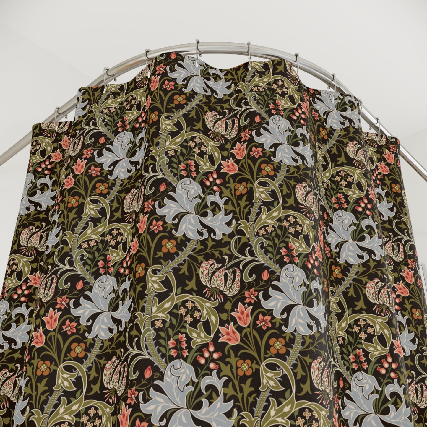 Patterned fabric on a hanger against a white background