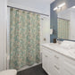 Bathroom with a floral shower curtain, sink, and mirror.