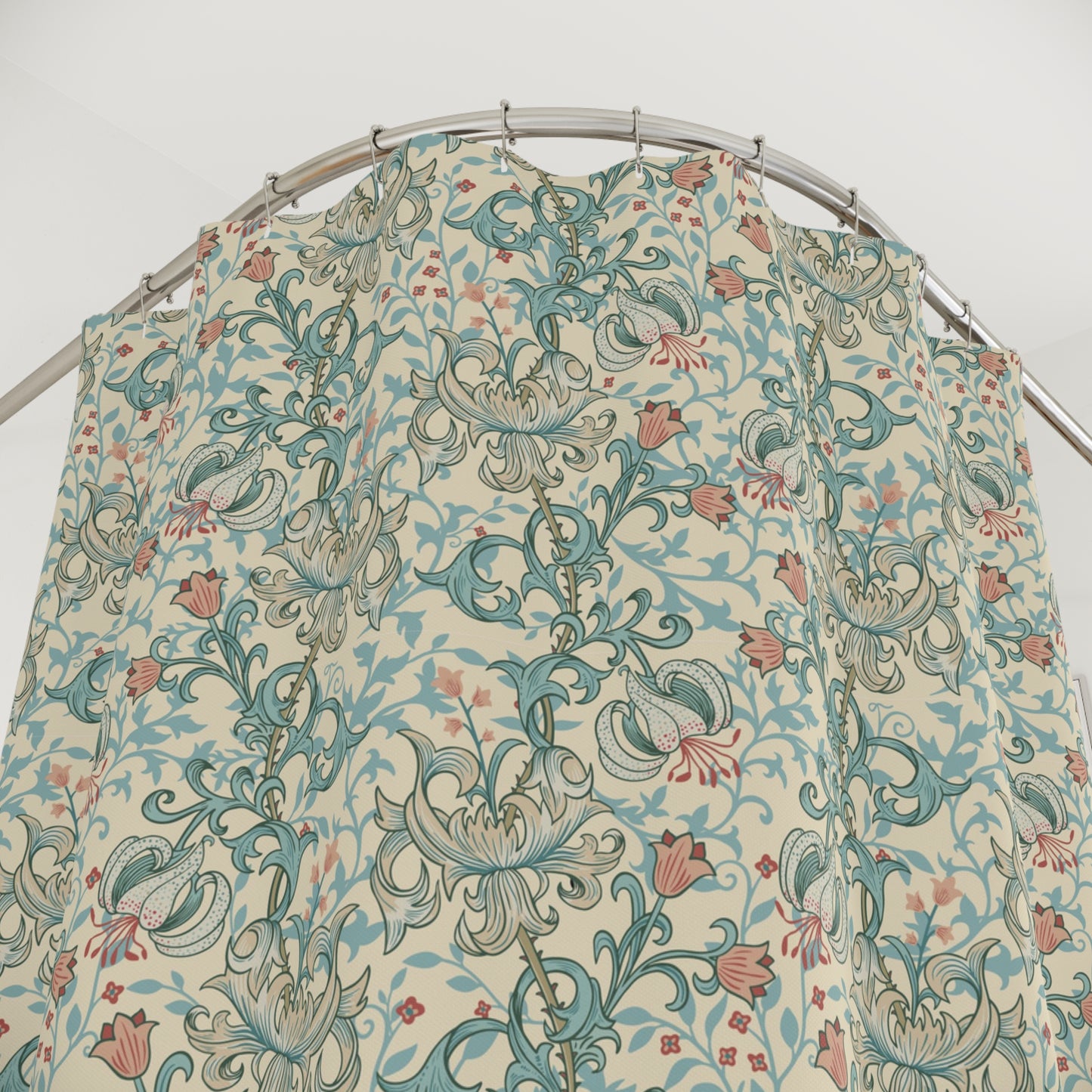 Floral patterned fabric on a metal rod against a white background