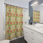 Bathroom with a floral shower curtain, white vanity, and mirror.