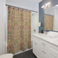 Bathroom with a floral-patterned shower curtain, white vanity, and mirror.