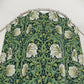 Floral patterned shower curtain against a white background