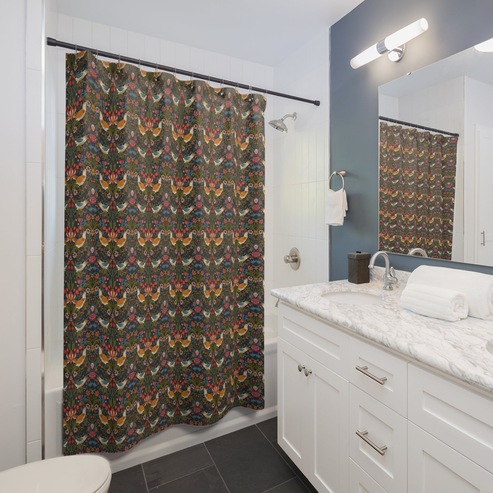 A shower curtain featuring a repeating William Morris & Co 'Strawberry Thief' pattern with birds and floral motifs on a dark background.