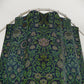 Fabric with a green and blue pattern on a white background