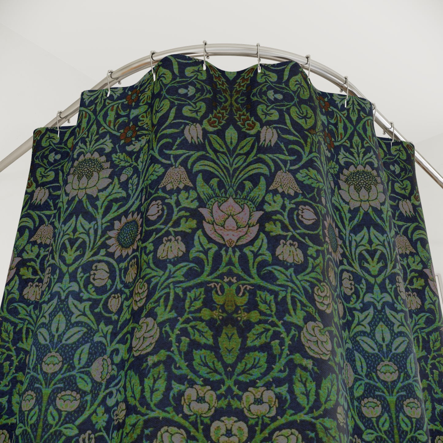 Fabric with a green and blue pattern on a white background