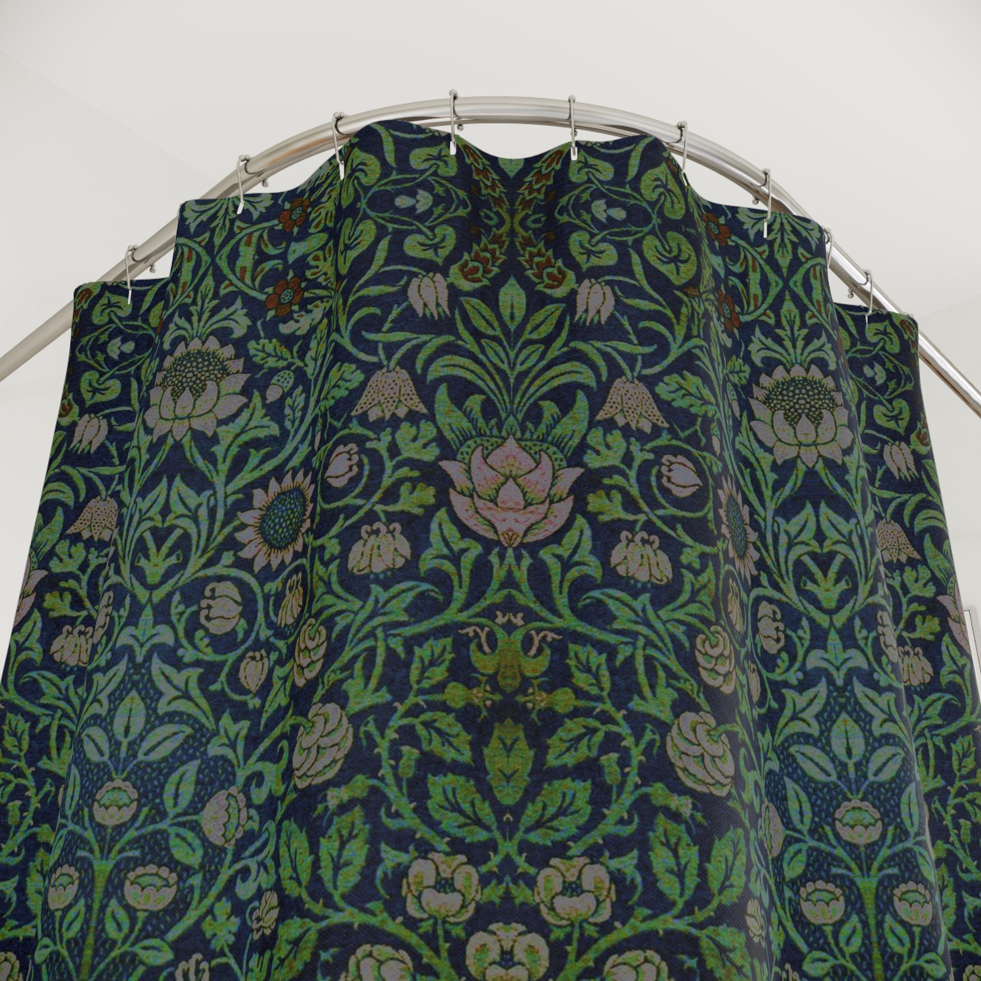 Fabric with a green and blue pattern on a white background