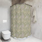 A shower curtain featuring a green floral pattern inspired by William Morris.
