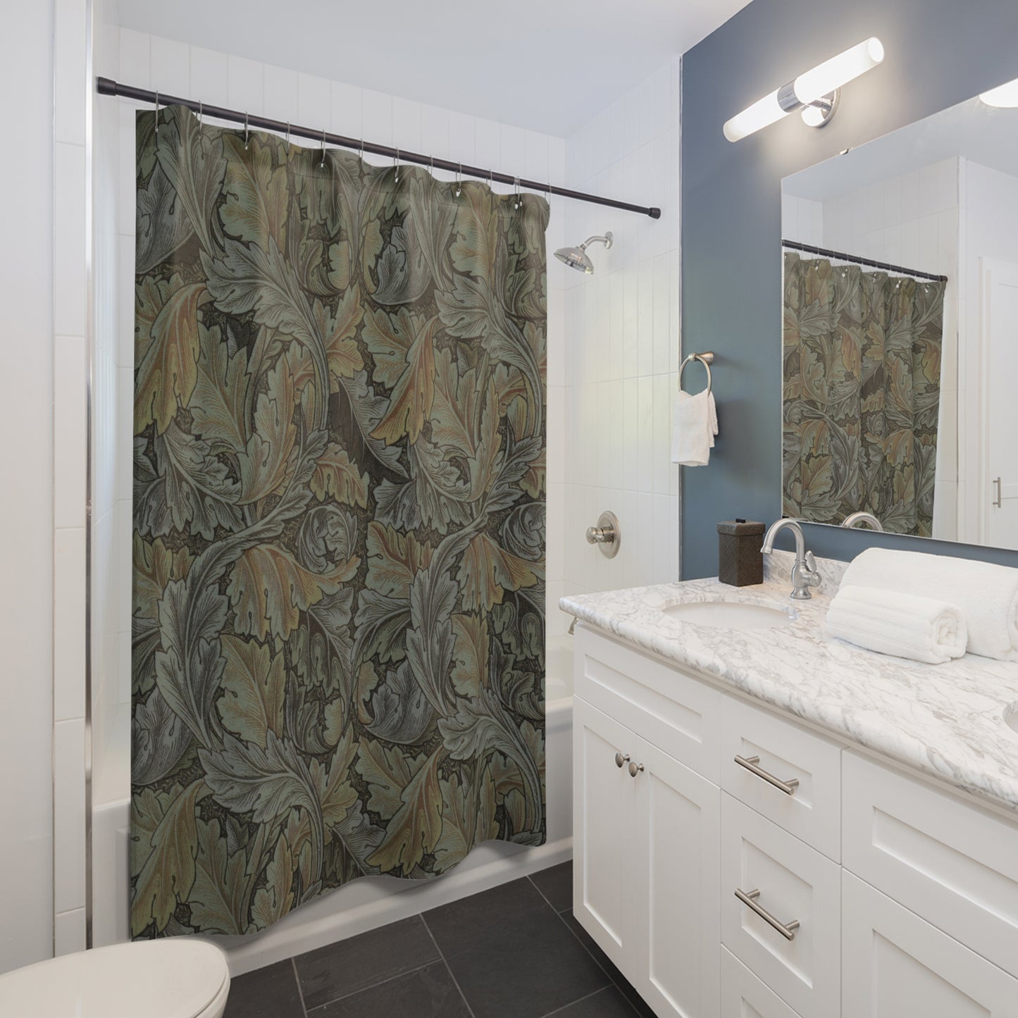 Bathroom with a patterned shower curtain, sink, and mirror.