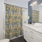 Bathroom with floral shower curtain, sink, and mirror.