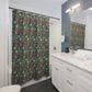 Bathroom with floral shower curtain, white vanity, and mirror.