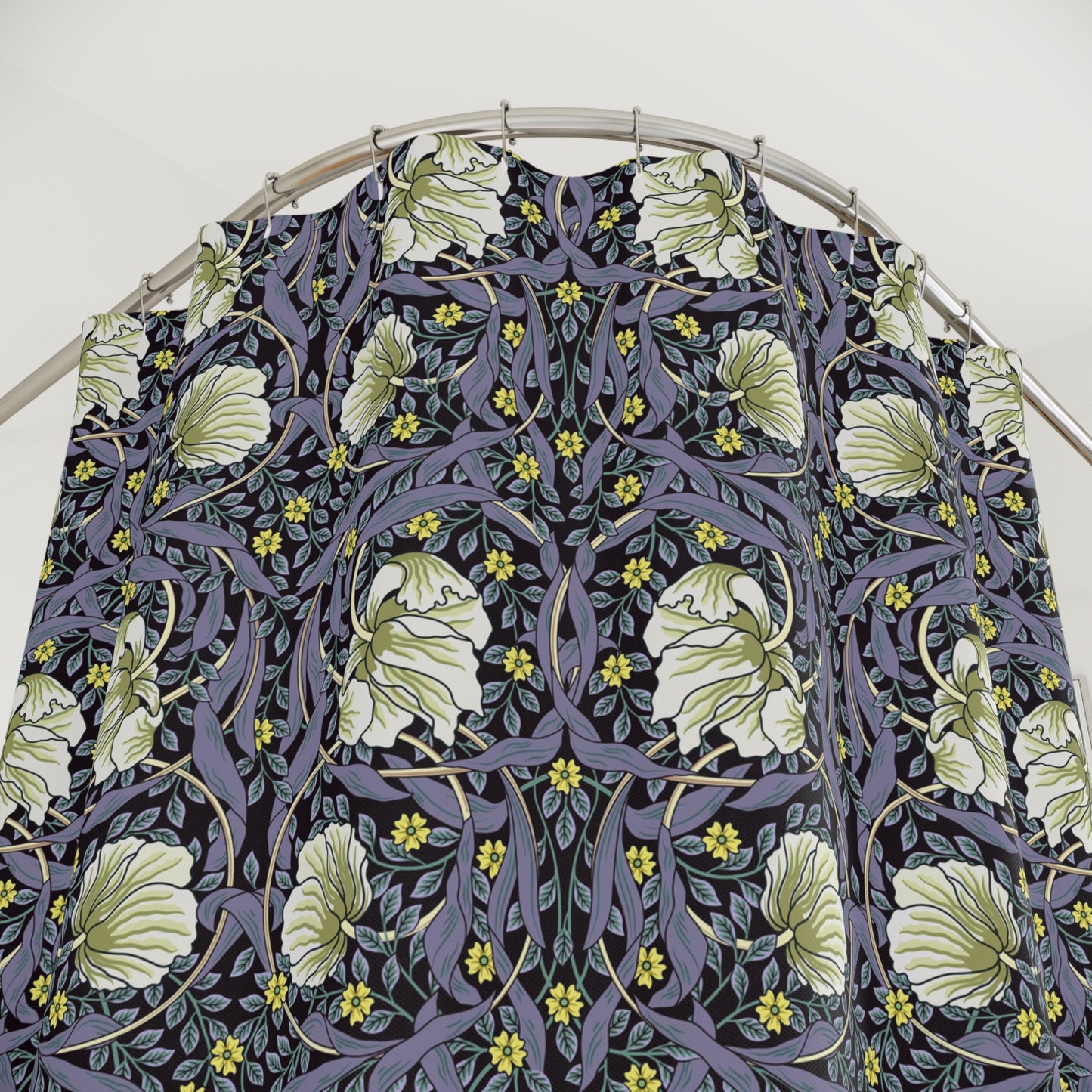 Floral patterned shirt on a hanger against a white background