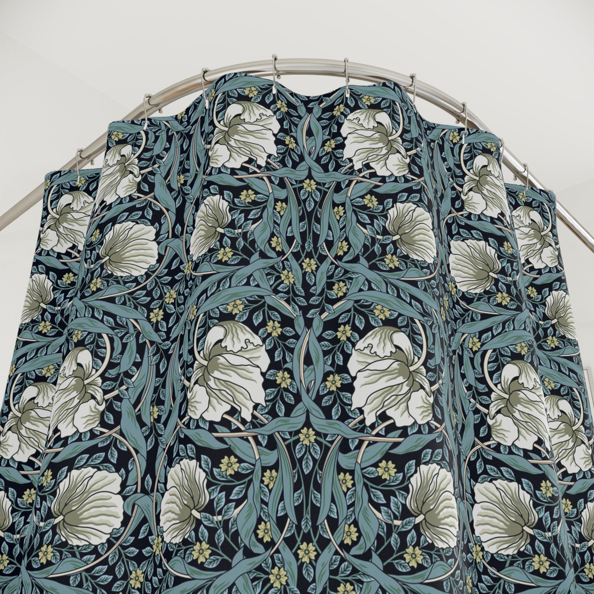 Floral patterned PVC shower curtain against a white background