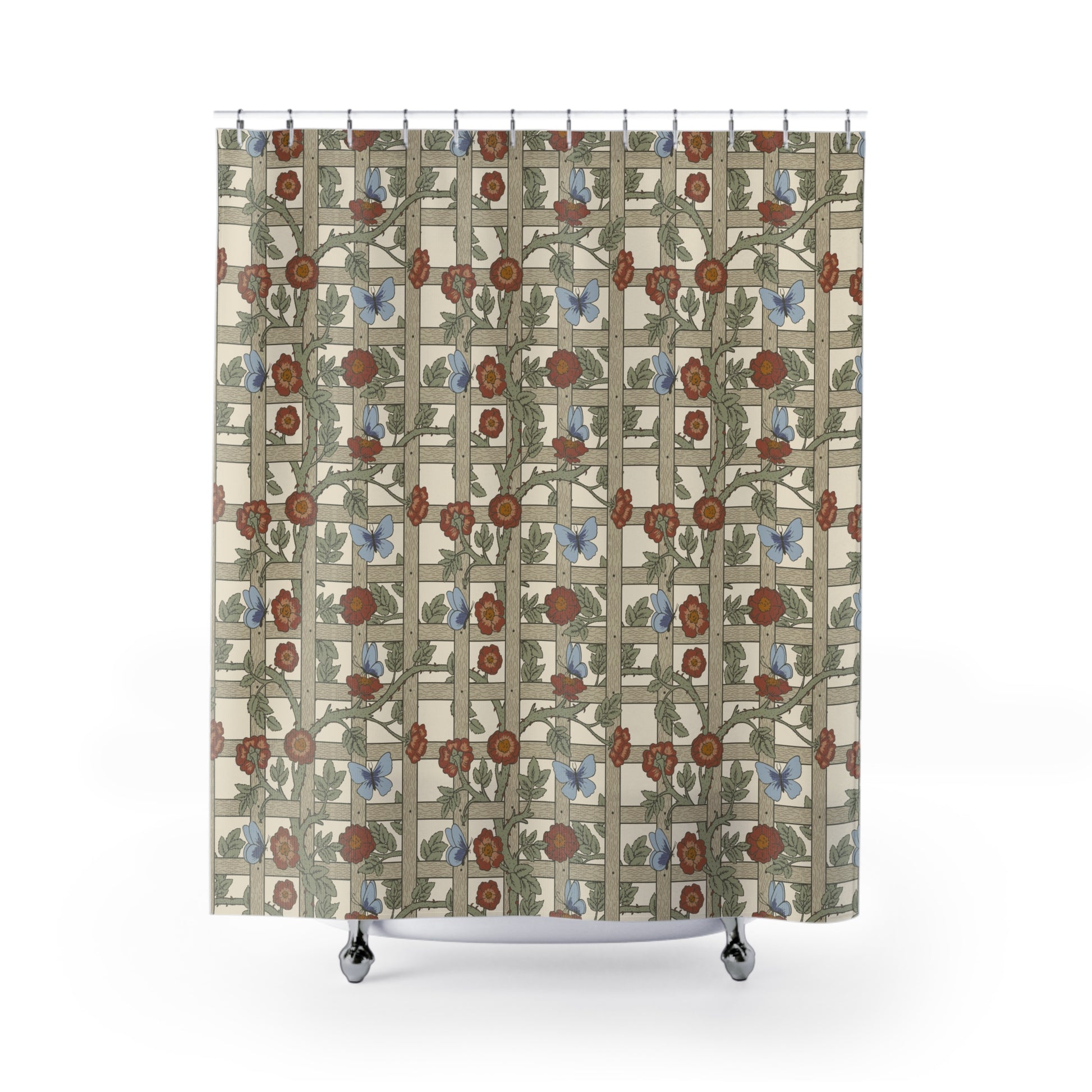 A shower curtain with a geometric William Morris & Co pattern featuring floral elements in beige, red, and blue colours on a white background.