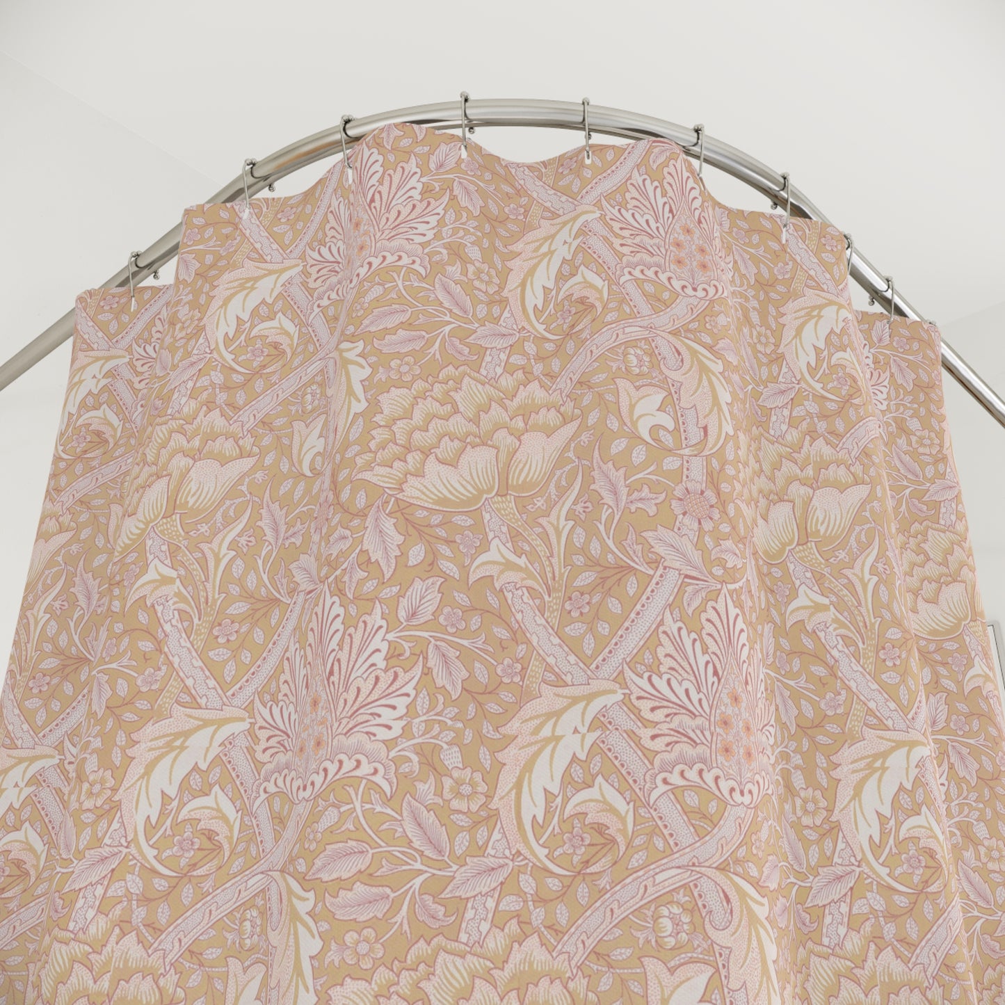 A shower curtain with a floral pattern in shades of pink and beige, inspired by the art of William Morris.
