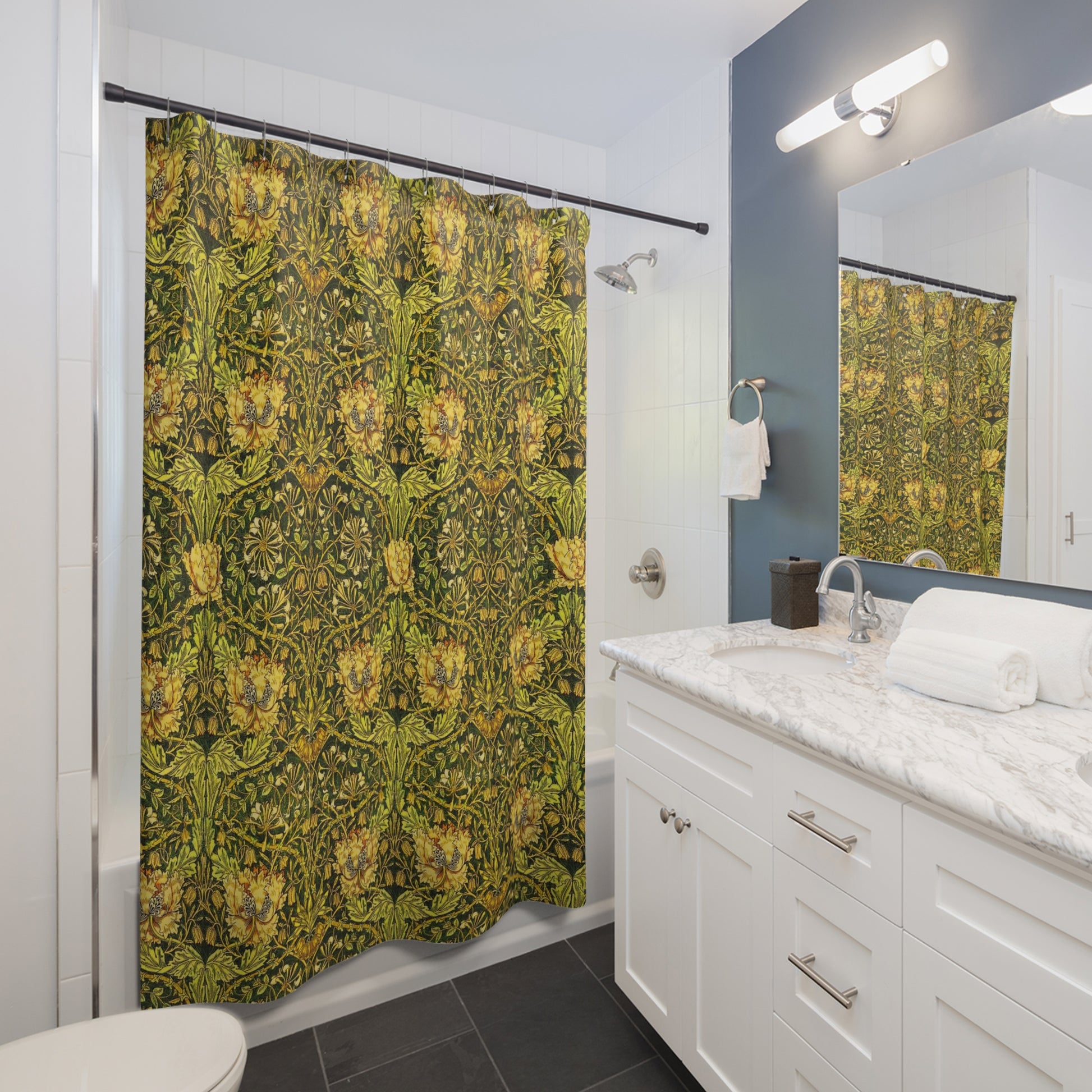 A shower curtain with a gold and green floral pattern inspired by the Victorian era and the art of William Morris.