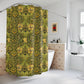 A shower curtain with a gold and green floral pattern inspired by the Victorian era and the art of William Morris.