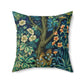 A square-shaped faux suede cushion with an all-over print featuring a nature-inspired design with pheasants and squirrels in a blue and green William Morris & Co floral background.