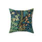 A square-shaped faux suede cushion with an all-over print featuring a nature-inspired design with pheasants and squirrels in a blue and green William Morris & Co floral background.