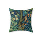 A square-shaped faux suede cushion with an all-over print featuring a nature-inspired design with pheasants and squirrels in a blue and green William Morris & Co floral background.