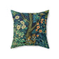 A square-shaped faux suede cushion with an all-over print featuring a nature-inspired design with pheasants and squirrels in a blue and green William Morris & Co floral background.