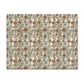 A rectangular placemat with a vintage Art Nouveau floral pattern featuring orange-red flowers, green leaves, and light blue butterflies on a beige and gray lattice background.