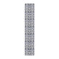 Long, narrow rug with a gray and white floral pattern on a white background