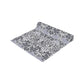 Roll of fabric with a floral pattern on a white background