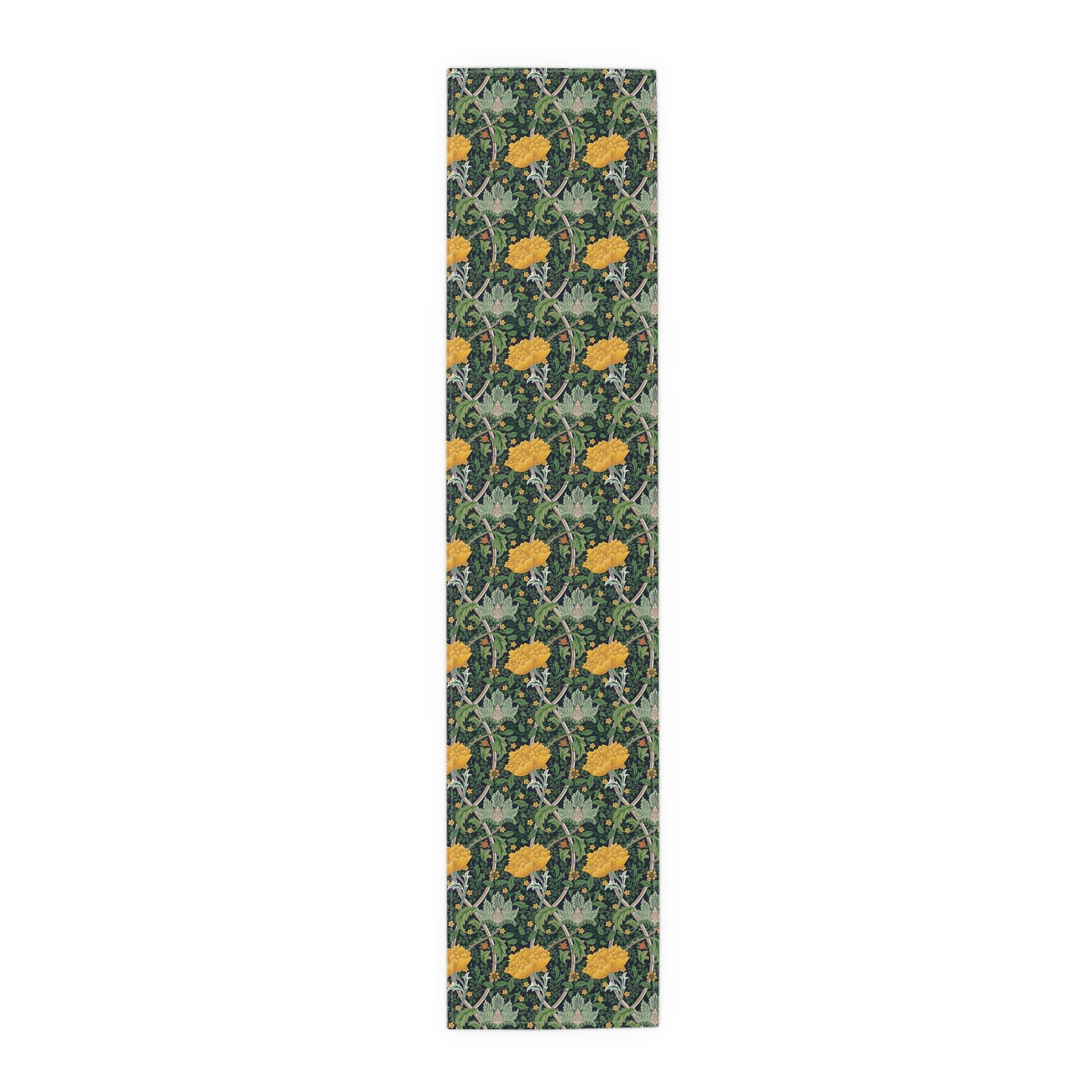 A yellow and green floral William Morris & Co patterned table runner with hemmed edges displayed on a dining table.
