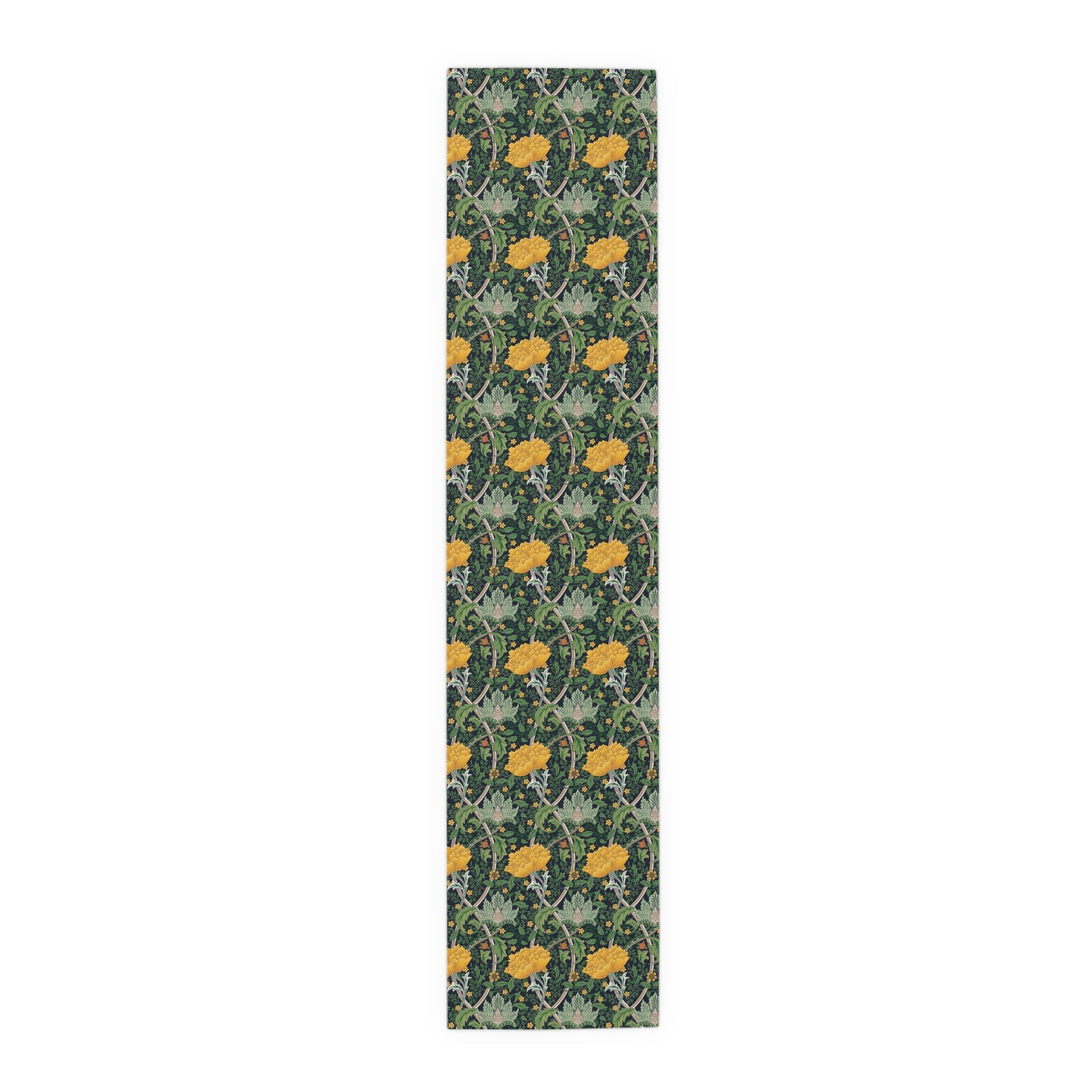 A yellow and green floral William Morris & Co patterned table runner with hemmed edges displayed on a dining table.