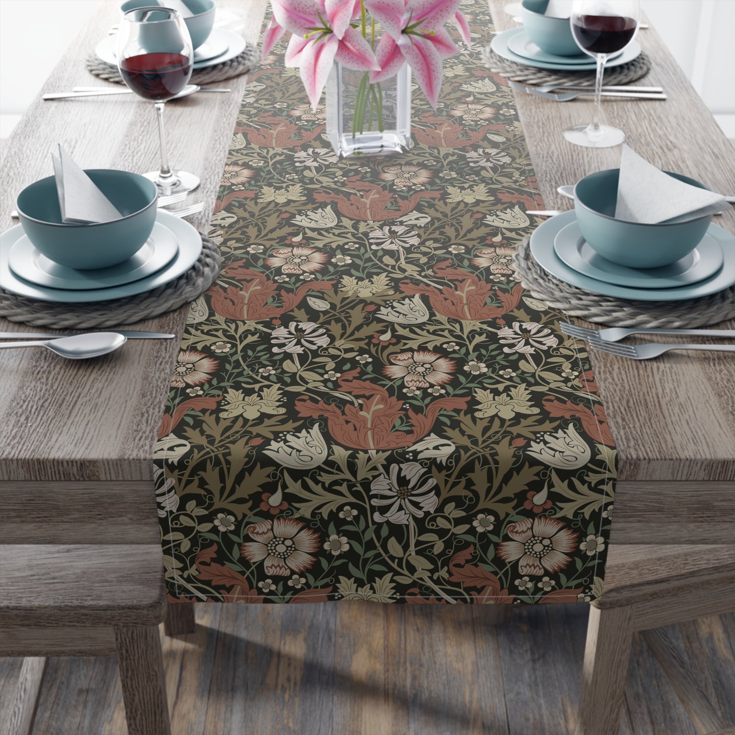 A floral patterned table runner inspired by William Morris, displayed on a dining table.