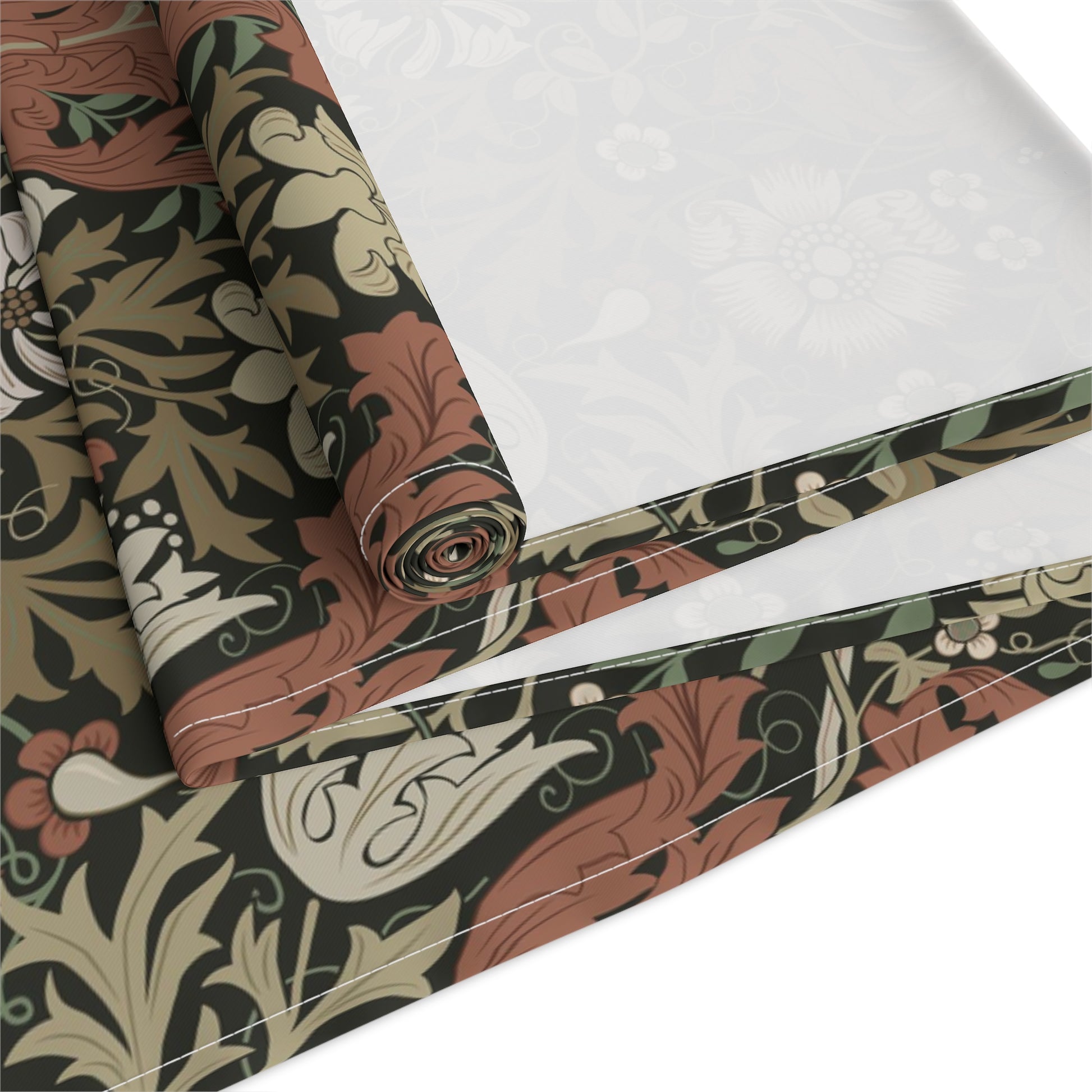 A floral patterned table runner inspired by William Morris, displayed on a dining table.