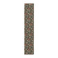 A floral patterned table runner inspired by William Morris, displayed on a dining table.