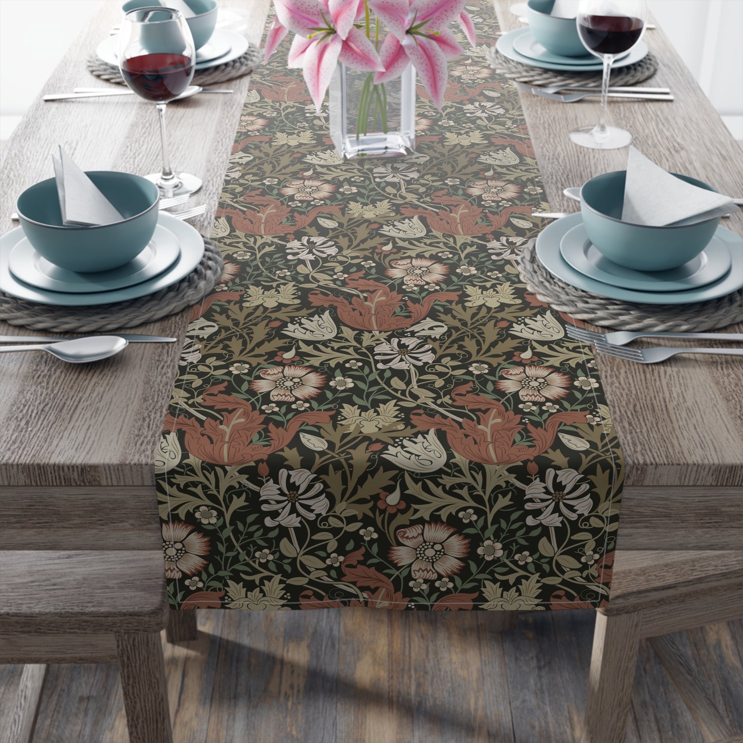 A floral patterned table runner inspired by William Morris, displayed on a dining table.
