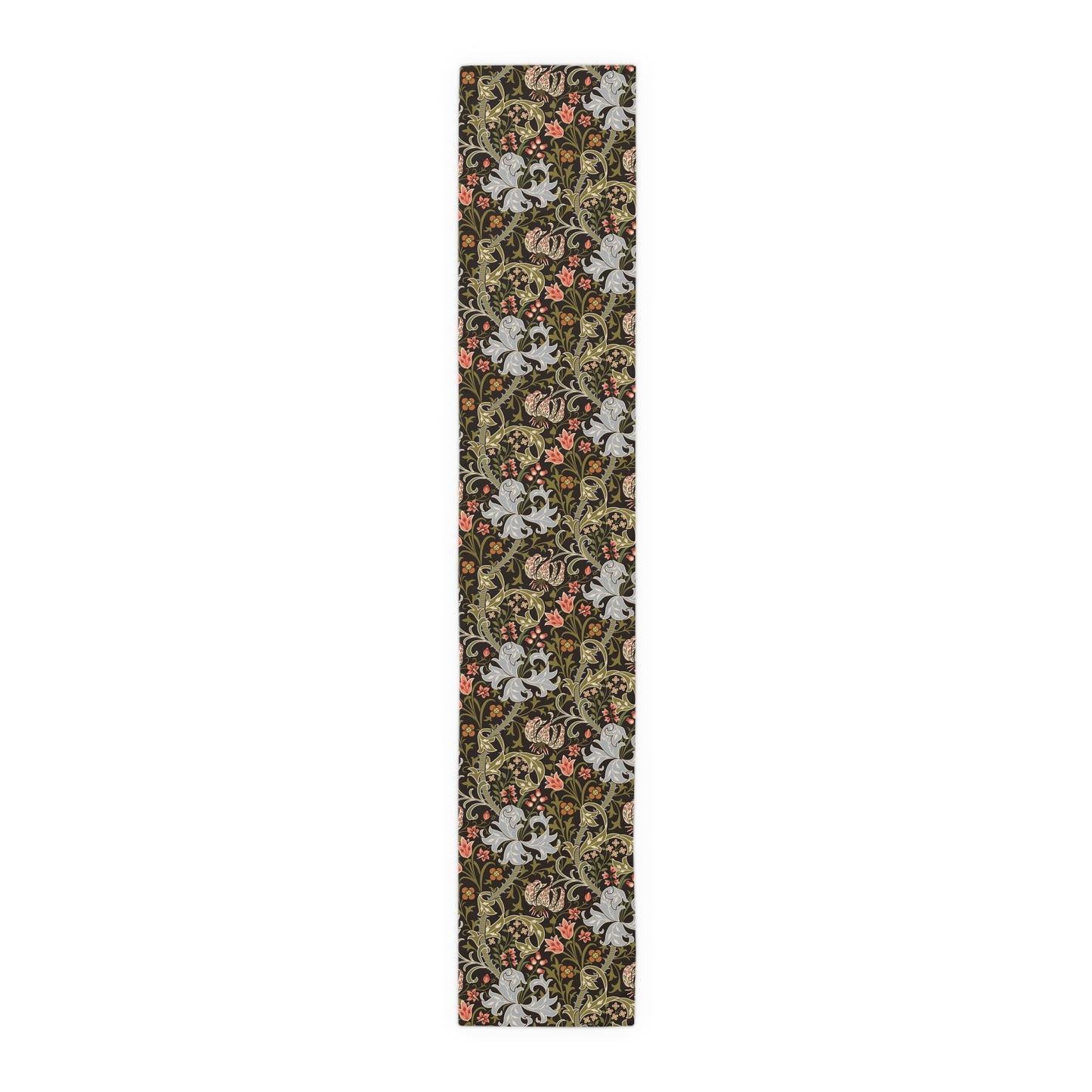 A table runner with a floral William Morris & Co pattern in shades of green, gold, and other colours, laid out on a dining table with dishes and glasses arranged on top.