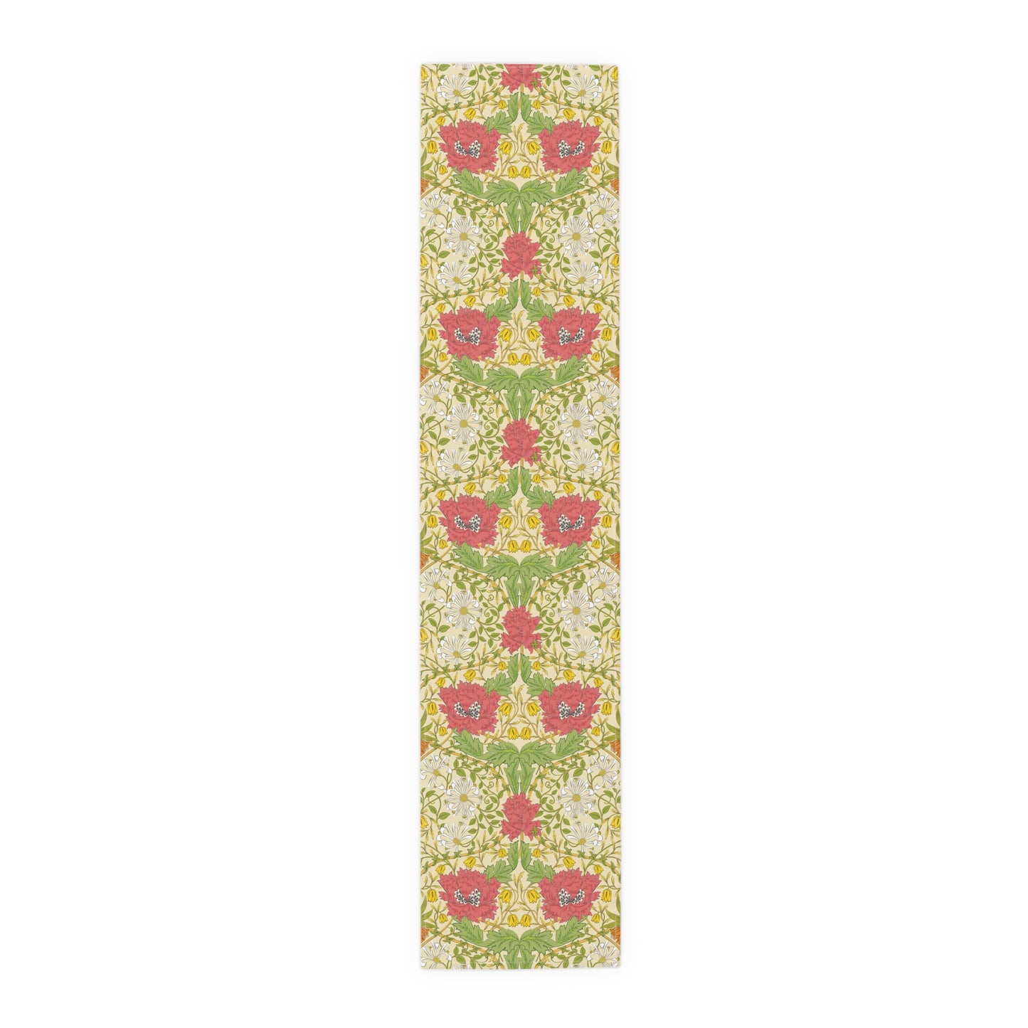 A table runner with a floral William Morris & Co pattern in red, green, and white colours, laid out on a dining table.