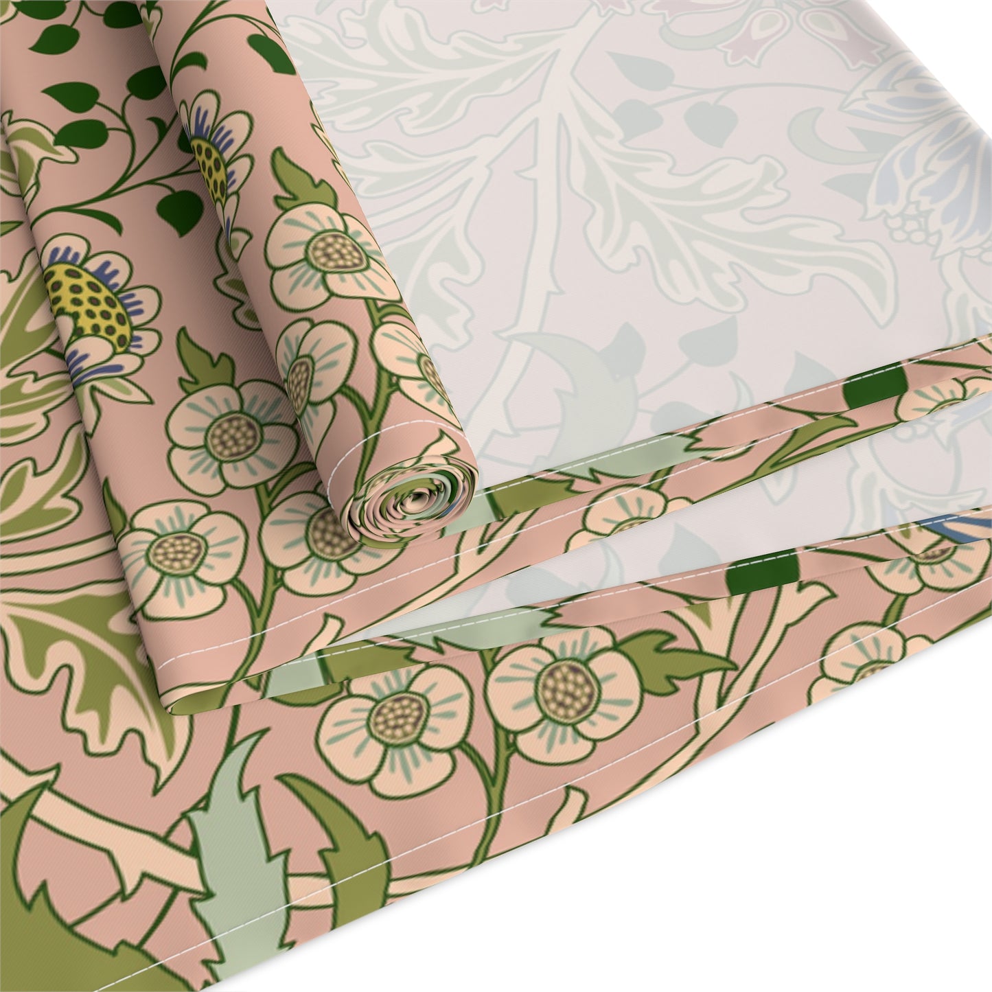A floral patterned table runner inspired by William Morris' work, displayed on a dining table.
